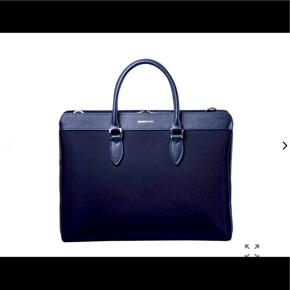 Alpha leather Safiano trimmed bag.Free card holder